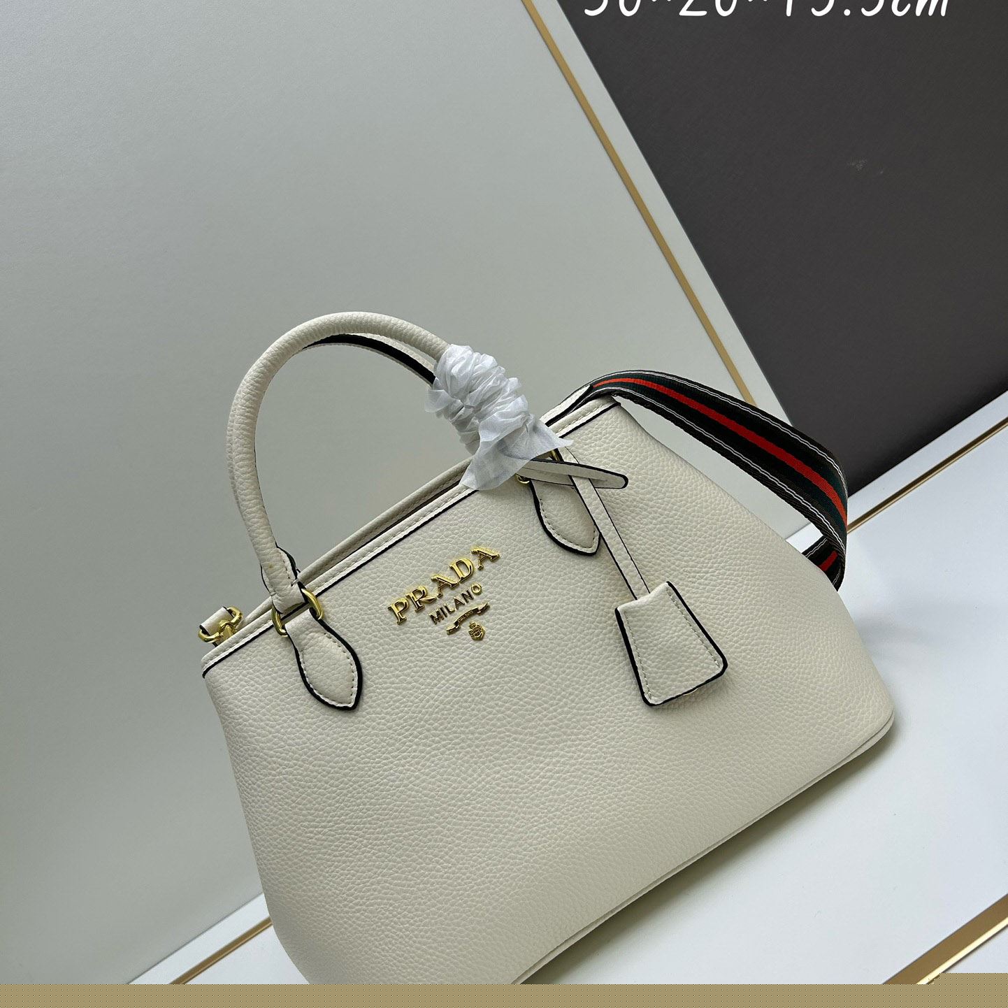 Pra*a top handle bags